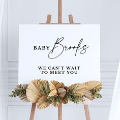 a sign that says baby bridals we can't wait to meet you