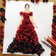 a drawing of a woman in a dress made out of cherries and blackberries