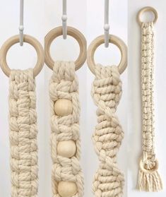 three different types of rope hangings with wooden balls and rings attached to each other