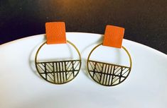 Art Deco Metal Leather Hoops Earrings The Brenda Earring | Etsy Cardboard Jewelry, Art Deco Metal, Cardboard Jewelry Boxes, Deco Earrings, Recycled Cardboard, Hoops Earrings, Brass Charms, Art Deco Earrings, Orange Leather