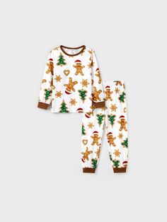 Product Introduction: Celebrate the festive season together with these Christmas printed matching family pajamas featuring a cute gingerbread Man man, Christmas tree, and snowflake prints.
Fabric: Made of 95% polyester and 5% spandex.
Care Instruction: Machine washable. Do not bleach. Iron on low heat.
Key Features: * Please add each size separately to your shopping cart.
* Product features: Christmas family pajamas 
* Fabric characteristics: Soft and stretchy 
* Piece of product: includes 1 set (1 top and 1 bottom set, or 1 jumpsuit, or 1 pet wrap) per size selection.
* Neckline: Round neck 
* Sleeves: Long sleeves 
* Style: Classic and festive 
* Fit: Loose and comfortable 
* Length: Full length 
* Source of goods: Directly from the supplier 
* Supplier: PatPat
Additional information: Pe Long Sleeve Pjs, Man Christmas Tree, Christmas Family Pajamas, Toddler Stuff, Prints Fabric, Christmas Parade, Sleeves Style, Family Christmas Pajamas, Matching Family Pajamas