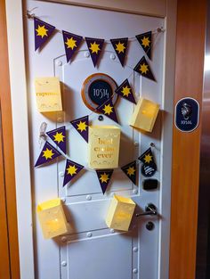 a door decorated with yellow and purple flags