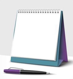 a notepad with a pen next to it