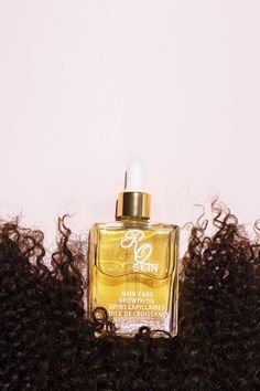 "Give your hair the royal treatment! Introducing RQ Skin \"Hair Care Oil\", our 100% organic hair oil specifically designed to hydrate and nourish your hair while taming frizz and adding a healthy shine.  Just take a few drops, rub between your palms and massage through your hair strands. Then style as you wish! Use on dry or wet hair.  *Low hear hair drying helps work the oil through on wet hair* Best For: Thick -> Curly -> Afro textured hair Ingredients: Castor Oil, Caprylic/Capric Triglycerid Hair Oil Product Photography Ideas, Hair Oil Advertisement Poster, Hair Oil Packaging Design, Hair Oil Advertisement, Hair Oil Spray, Organic Hair Oil, Hair Ingredients