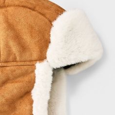 Treat your head to the warmth and style of this Polyester Faux Suede Faux Fur Trapper Hat from Goodfellow & Co™. Made from a heavyweight woven fabric and filling, this lined faux fur trapper hat offers your head and ears all-day cozy comfort. Designed with a back hook-and-loop fastener for a secure fit, it makes a standout addition to your collection of winterwear. Goodfellow & Co™: Feel good in what you wear, anywhere. Cozy Hats With Fleece Lining For Fall, Brown Hat With Plush Lining For Cold Weather, Brown Hats With Fleece Lining For Cold Weather, Windproof Hats For Cold Weather In Fall, Winter Brown Hats With Plush Lining, Fall Hats With Faux Fur Lining, Faux Fur Hat For Fall, Brown Insulated Winter Hat, Fall Faux Fur Hat With Lining