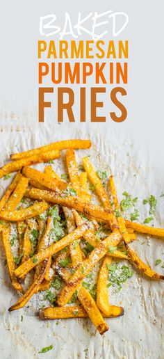 baked parmesan pumpkin fries on parchment paper with text overlay that reads baked parmesan pumpkin fries