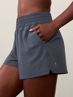 High Rise Weekender Run Short | Athleta Relaxed Fit Running Activewear With Pockets, Solid Activewear With Elastic Waistband In Recycled Polyester, Lightweight Athleisure Activewear, Lightweight Solid Athleisure Activewear, Lightweight Solid Activewear For Athleisure, Lightweight Solid Color Athleisure Activewear, Relaxed Fit Activewear With Elastic Waistband For Running, Sporty Solid Athletic Shorts In Recycled Polyester, Versatile Lightweight Activewear For Workout