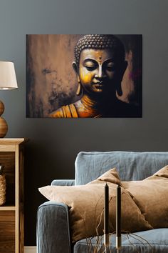 a buddha statue sitting on top of a blue couch