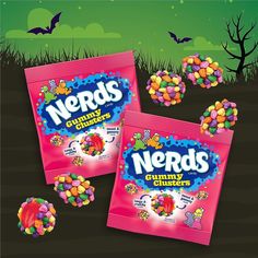 two bags of nerds candy sitting on the ground