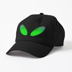 a black hat with green alien eyes on the front and side, against a white background