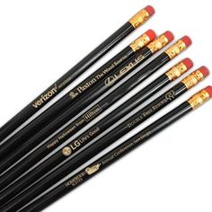 six black pencils with gold writing on them