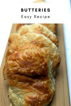 some type of bread that is on a cutting board with the words butteries easy recipe