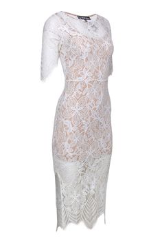 Go airy and ultra romantic with this darling frock from For Love & Lemons! Created with a white hot floral lace design in a trendy midi silhouette, this light and airy beauty is perfect for all your springtime soirees or even as an alternative wedding dress! Transform into the ultimate blushing bride when you pair this stunner with sparkly pumps and statement earrings. Size XS Shell: 100% Nylon Lining: 90% Polyester, 10% Spandex Concealed back zipper Built-in slip Round neckline Short sleeve All Fitted Lace Patchwork Dress For Brunch, Feminine White Scalloped Lace, Chic White Dress With Lace Bodice, White Fitted Dress With Lace Bodice, Feminine Lace Patchwork Dress For Brunch, Feminine Lace Dress With Patchwork For Brunch, Lace Dress With Lace Patchwork For Garden Party, Fitted Lace Dress With Lace Trim For Brunch, Fitted Lace Dress With Scalloped Lace For Spring