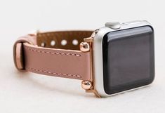 Full Grain Leather Pink Slim Band for Apple Watch 1-5Our leathers are premium quality full grain leather and tested by international firms.Size: Medium (fits 150-195mm (5.9"-7.6") wrists.)Adapter color: Silver, Black, Gold, Rose Gold. Adapters are made of stainless steel.Important: For Apple 4 Gold series, rose gold adapters match better than gold adapters.Color of buckle will be same of adapter color.For silver, gold and rose gold adapters, bead color will be same of adapter color. For black an Apple Watch Blue, Apple Watch Silver, Apple Watch Cuff, Apple Watch 1, Black Apple, Cuff Watch, Apple Watch Strap, Apple Watch Band, Black Watch