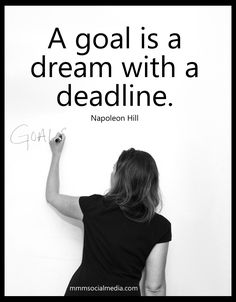 a woman writing on a whiteboard with a black and white quote above it that says, a goal is a dream with a deadline