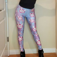 Unleash Your Inner Gaming Goddess W/ These Stunning Overwatch Wild Bangarang Blizzard D.Va Bunny Pastel Women's Leggings In Size S. Made For Women Who Love To Make A Statement, These Leggings Feature A Vibrant And Colorful Design That Will Turn Heads Wherever You Go. Crafted From High-Quality Materials, These Leggings Are Designed To Last. Whether You're Gaming Or Just Hanging Out With Friends, You'll Feel Comfortable And Stylish In These Leggings. Your Love For Overwatch Never Worn / Smoke-Free Cute Pink Stretch Bottoms, Cute Stretch Pink Bottoms, Cute Pink Fitted Pants, Cute Fitted Pink Pants, Fitted Playful Leggings For Spring, Fitted Cute Pink Pants, Playful Fitted Leggings For Spring, Purple Trendy Leggings For Spring, Pink Tight Pants For Spring