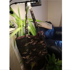 "Fully handmade  large camo  bag with lining, red pocket and rasta tag and snap button in bronze, Two options available: 1. Green camo with brown lining : length: 18\", width 20\", handles 14\" 2 grey camo with black lining length : 18,5 \", width 22\", handles 14\"" Camo Bag, Boat Tote, Slouchy Tote, Concealed Carry Purse, Wire Headband, Red Pocket, Grey Camo, Travel Bags For Women, Crossbody Wallet