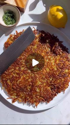 Nadia Aidi on Instagram: "Potato Rösti or Pommes Darphin…Honestly it is freaking delicious! Especially with smoked salmon & créme fraîche. Inspired by one served in a local restaurant.

Ingredients:
* 3-4 large yukon gold potatoes.
* 3 tbsp melted butter.
* 2 tbsp olive oil (a bit more for the pan and adding to the salmon).
* Salt and pepper to taste.
* labneh or créme fraîche to taste.
* smoked salmon to taste.
* chives to taste.
* Black pepper.
* 1 lemon (zest).

Directions:

1. Grate your potatoes and squeeze out every last bit of moisture out of them using a kitchen towel (clean obvs) or cheesecloth.
2. Add the melted butter and olive oil to the potatoes and season.
3. Preheat a cast iron for 2 min on high.  Add olive oil and the potatoes.
4. Gently press it with the spatula but don’t Gold Potatoes, Yukon Gold, Yukon Gold Potatoes, Polish Recipes, Savoury Cake, Cheese Cloth, Local Restaurant, Smoked Salmon, Lemon Zest