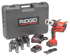 the ridgid cordless driller is in its case and it's accessories