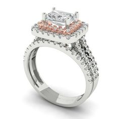 a white and pink diamond engagement ring