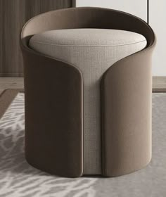 a round chair sitting on top of a white rug