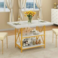 a kitchen table with yellow flowers on it