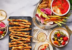 an assortment of appetizers and snacks on a table