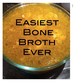 a bowl filled with broth and the words easiest bone broth ever