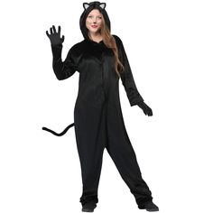 a woman in a black cat costume is waving at the camera with her hands up