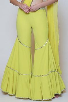 Shop for Preeti S Kapoor Yellow Georgette Draped Gharara Saree Set for Women Online at Aza Fashions Fitted Georgette Pants For Festive Occasions, Festive Fitted Georgette Pants, Fitted Bollywood Bottoms For Navratri, Bollywood Style Bottoms For Eid Party, Bollywood Style Party Bottoms For Eid, Fitted Wide Leg Festive Palazzo Set, Fitted Bottoms For Party And Eid, Fitted Bottoms With Traditional Drape For Navratri, Bollywood Style Fitted Designer Pants