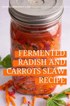 a jar filled with carrots and some leaves