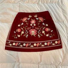 Women's Harper Brand Size Medium Skirt. Burgundy Color Shirt With Embroidery Flower Deigns. Zipper On The Side And Works Properly. New With Tags. Red Floral Embroidery Skirt For Spring, Bohemian Embroidered Fitted Mini Skirt, Fitted Bohemian Embroidered Mini Skirt, Bohemian Fitted Mini Skirt With Floral Embroidery, Fitted Red Skirt With Floral Embroidery, Red Embroidered Cotton Skirt, Red Bohemian Embroidered Skirt, Bohemian Embroidered Red Skirt, Red Embroidered Bohemian Skirt