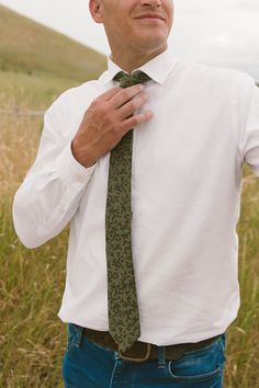 Elevate your man's professional attire with the Max Mens Tie in Teagan Floral. Featuring a unique print, 100% cotton material and a self-tie style - allowing for a comfortable fit every time. Stay stylish and polished with this versatile accessory. Perfect for wedding season, work, date night, family matching and more. Spring Business Cotton Suit And Tie Accessories, Fitted Cotton Suit And Tie Accessories, Fitted Cotton Tie, Dapper Cotton Ties For Business, Cotton Ties For Workwear In Spring, Semi-formal Ties For Spring, Spring Cotton Ties For Black Tie Events, Casual Standard Tie For Workwear, Casual Suit And Tie Accessories For Workwear