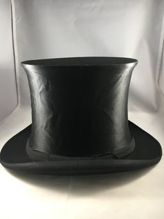 Carl Schilling Berlin Collapsible Silk Top Hat. Opera Hat. Original Box edges are separating. Hat is in good condition except where the inside metal from folding is starting to poke thru. Also you can hear that the inside of the hat is deteriorating. When you flip it things move. Small size, my head is 20'' in diameter and hat fits perfect. Size 6 or 6 1/4. Hat Fits, Vintage Display, Top Hats, Ring Displays, Clam Shell, Top Hat, Silk Top, Minneapolis, Vintage Rings