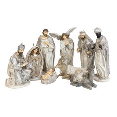 a group of figurines depicting the birth of jesus