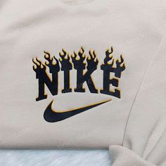 Introducing the Black Flame Nike Embroidered Sweatshirt, a must-have for fashion-forward individuals. This sleek and stylish sweatshirt features a striking Nike Fire Sweatshirt, Nike Embroidered Sweatshirt, Nike Inspired, One Piece Hoodie, Sweatshirt Nike, Black Flame, Nike Sweatshirts, Custom Nikes, Embroidered Clothes