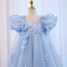 Make your little girl feel like a princess with our Dreamy Vow Sky Blue Arabic Flower Girl Dress. The delicate 3D flowers and crystal embellishments, along with a stunning cape and puffy sleeves, will make her stand out at any wedding or birthday party. Available now in charming sky blue. Yellow Evening Dresses, Silver Evening Dress, Grey Evening Dresses, Champagne Evening Dress, Gold Evening Dresses, Green Evening Dress, Pink Evening Dress, White Evening Dress, Red Evening Dress