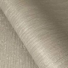 a close up shot of silver fabric