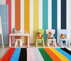 children's room with multicolored striped wallpaper