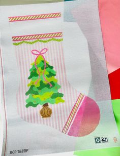 a christmas stocking with a tree on it