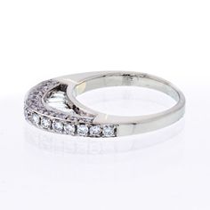 2 carat Platinum Arched Pave And Baguette Wedding Ring. Center Diamond Weight: 2.30Metal Type: PlatinumMetal Weight: 6.5 gr.Stock: RR7125Era: Modern Moissanite Half Eternity Rings With Baguette Cut, Modern Wedding Diamond Ring With Baguette Diamonds, Channel Set Diamond Ring With Baguette Cut Cubic Zirconia, Modern Wedding Ring With Baguette Diamonds, Platinum Baguette Diamond Wedding Rings, Baguette Cut Diamond Ring With Channel Set Cubic Zirconia, Platinum Wedding Rings With Baguette Diamonds, Baguette Cut Cubic Zirconia Diamond Ring With Channel Set, Platinum Rings With Baguette Diamonds For Wedding