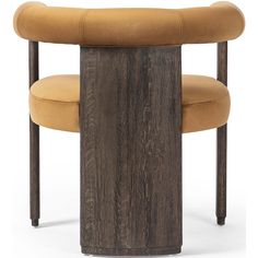 a round wooden table with a tan upholstered chair in the center and two legs on each side