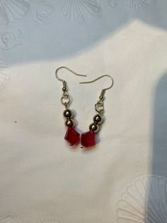 Handcrafted earrings made to imitate the earring Childe wears. Two gold beads above a red gemstone. Genshin Earrings, Childe Tartaglia, Red Gemstones, Handcrafted Earrings, Gold Beads, Jewelry Earrings Dangle, Selling On Etsy, Etsy Earrings, Sell On Etsy