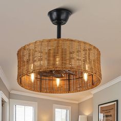 a wicker basket light fixture in a living room