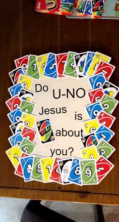 a sign that says do u - no jesus is about you? on a table