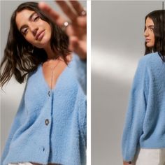 Nwt Uo Blue Thea Fuzzy Cardigan Trendy Light Blue Winter Cardigan, Oversized Blue Soft Knit Outerwear, Cozy Blue V-neck Outerwear, Blue Soft Knit Long Sleeve Outerwear, Cozy Blue Soft Knit Outerwear, Cozy Blue Long Sleeve Cardigan, Casual Light Blue Winter Cardigan, Light Blue V-neck Cardigan For Winter, Light Blue V-neck Winter Cardigan