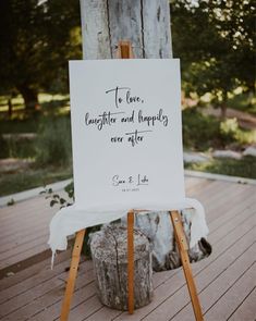 an easel sitting on top of a wooden floor next to a white sign that says stella matters