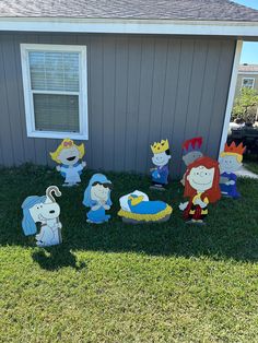 some cartoon characters are in front of a house