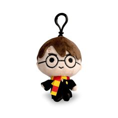 a small stuffed toy with glasses and a tie on it's keychain