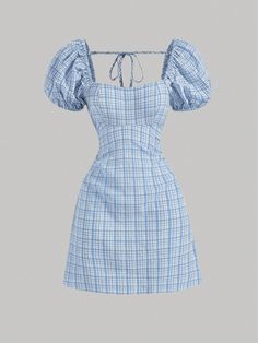 a blue and white checkered dress with puff sleeves